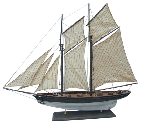 Yacht à voile en bois - voiles cousues - décoration marine